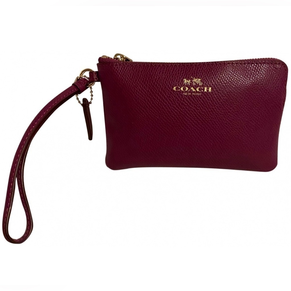 Coach pink leather wristlet bag